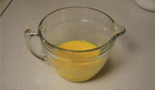 Mix eggs and sugar until well blended